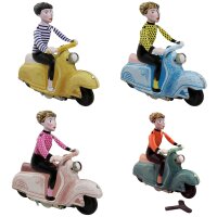Tin toy scooter girl girl on a motor scooter scooter