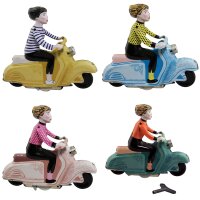 Tin toy scooter girl girl on a motor scooter scooter