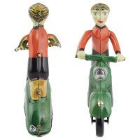 Tin toy scooter girl green girl on a motor scooter scooter
