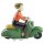 Tin toy scooter girl green girl on a motor scooter scooter