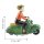 Tin toy scooter girl green girl on a motor scooter scooter