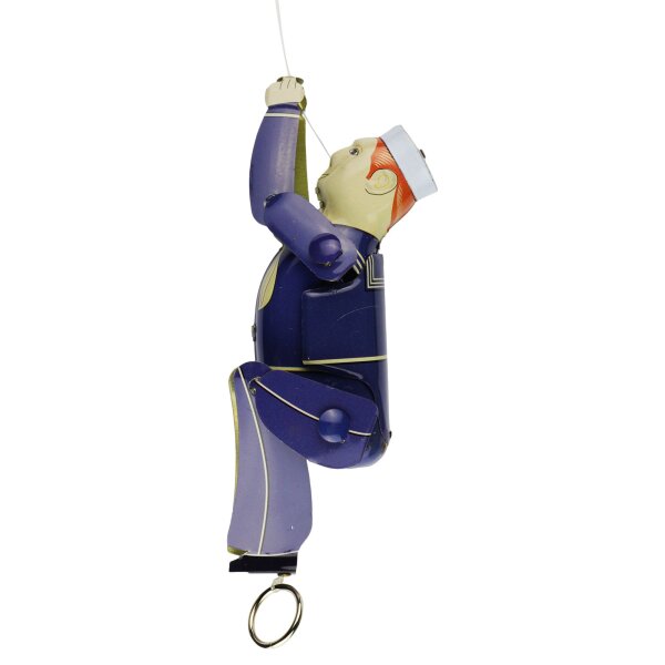 Tin toy climbing figure sailor on a string tin sailor